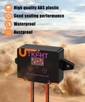 Badass Waterproof Dc 12-36V Low Voltage Protector And Battery Disconnect Switch For Solar Systems Lead Acid Lithium Batteries Marine Rv Off Road Adventures with digital display in sandy background.