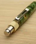 Close-up of a green pen from Set Of 5 DuraClick EDC Ballpoint Pen Woodturning Kits With Hardware And Bushing Included.