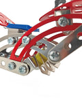 Close-up of 99 Piece Metal Motorcycle Model Building Kit parts in red and silver, showcasing alloy and chrome details for DIY chopper bike fans.