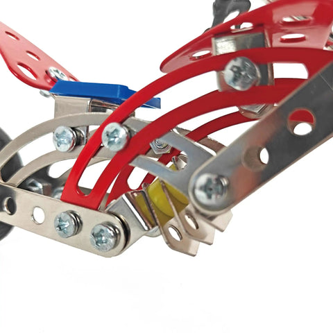 Close-up of 99 Piece Metal Motorcycle Model Building Kit parts in red and silver, showcasing alloy and chrome details for DIY chopper bike fans.