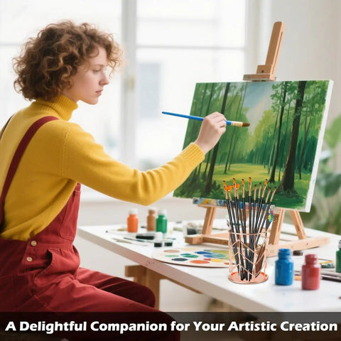 Artist painting at an easel with Two Piece Square Post Note Holder And Circle Pen Holder Metal Desk Organizer Set in rose gold visible