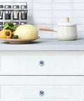 4 Pack Blue Butterfly and Flower Crystal Glass Cabinet Knobs on white kitchen drawers, 1.37 Inch, decorative hardware.
