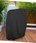 Black garden furniture cover for outdoor table and chairs, weather resistant shield on patio, foldable and easy to store.
