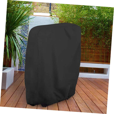 Black garden furniture cover for outdoor table and chairs, weather resistant shield on patio, foldable and easy to store.