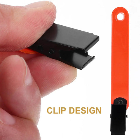 Front view of Glow Reflective Trail Marker Clips for Outdoor Hiking and Hunting, orange PVC clip with black spring mechanism.