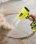 Person using Cordless Turbo Jet Leaf Blower For Lawn Debris, Driveway Sand And Car Drying, 450 CFM High Speed model on driveway