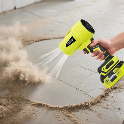 Person using Cordless Turbo Jet Leaf Blower For Lawn Debris, Driveway Sand And Car Drying, 450 CFM High Speed model on driveway