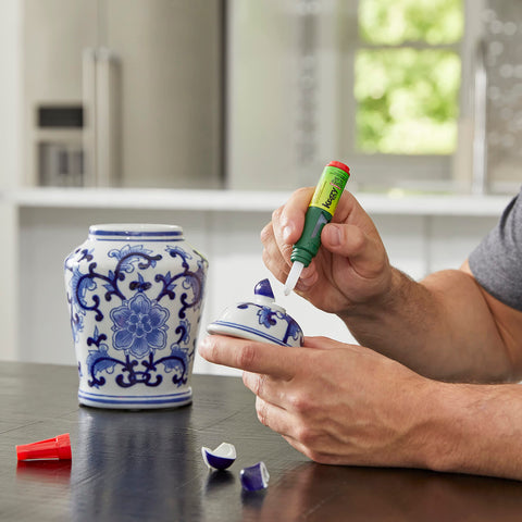 Precision Control Quick Dry Super Glue Pen for Plastic Ceramic Wood Metal and More in use fixing a broken ceramic lid