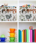 Large Foldable Storage Bin Basket With Easy Grab Reinforced Cotton Rope Handle Collapsible Fabric Laundry Hamper Rectangle Bin For Clothes And Toys Cute Woodland Animals Pattern Ideal For Bedroom Closet Laundry Room And Dorm with stuffed animals and toys inside, on a shelf with colorful books and cups.