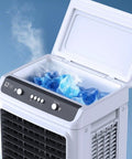Ditch The Summer Scorch And Grab This Mobile Evaporative Air Cooler With A Massive Water Tank To Kick The Heat Sideways Hella Efficient Indoor Outdoor Swamp Cooling For Ultimate Chill Zones Anywhere showing ice cubes in reservoir.