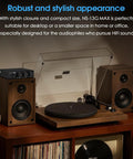 Beast 300W Per Channel Class D Stereo Amplifier with Phono Input beside turntable and speakers on wooden shelf