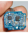 Close-up of a 12mm Coreless High Speed Magnetic Motor With Hall Encoder And Integrated Drive Board For Robotics, Beefed Up Micro Servo Motor Module With Bus Drive circuit.