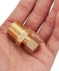Close-up of brass compression tube fitting connector, straight coupling, 3/8 in tube OD x 1/2 in NPT male