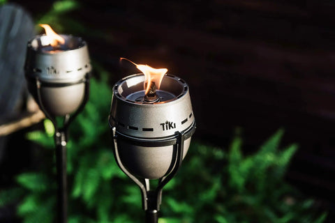 65 Inch Outdoor Torch With Amped Up Extra Large Flame For Patio Garden Lawn And Backyard Weather Resistant Refillable And Decorative Torch In Silver Finish Twist And Pour Refilling For Mess Free Fueling