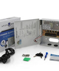 4 Channel 12V DC Power Supply Box With Individually Fused Ports Delivering 5 Amps Per Channel For CCTV, LED And All 12V DC Devices Heavy Duty Commercial Grade Enclosure Includes Screwdrivers And Extra Fuses with packaging and accessories.