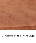 Close-up of Pro Grade Copper Wire Mesh Screen 40 Mesh Dense Filter showing texture and sharp edge caution text.