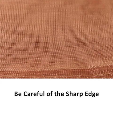 Close-up of Pro Grade Copper Wire Mesh Screen 40 Mesh Dense Filter showing texture and sharp edge caution text.