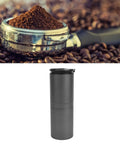 Grab Fresh Brew On The Fly With This Portable All In One Coffee Grinder And Brewer Featuring A Rechargeable Battery Adjustable Settings And Cordless Design Perfect For Travel Camping Or Office Use. Black travel coffee brewer next to ground coffee.
