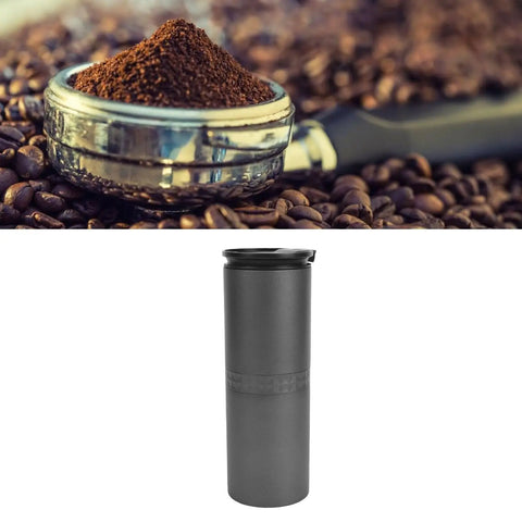 Grab Fresh Brew On The Fly With This Portable All In One Coffee Grinder And Brewer Featuring A Rechargeable Battery Adjustable Settings And Cordless Design Perfect For Travel Camping Or Office Use. Black travel coffee brewer next to ground coffee.