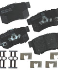 Front view of Bendix Premium SBC1086 ceramic rear brake pads kit with four pads and mounting hardware
