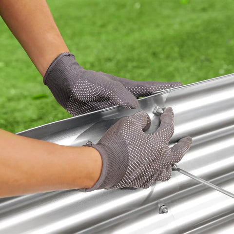 Hands assembling Sturdy Galvanized Metal Raised Garden Bed Kit Three Pack 6x3x1ft Outdoor Planter Box. Silver finish, weatherproof.