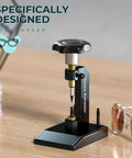 Broken Screw Eyeglasses Extractor A Heavy Duty Glasses Repair Tool next to sunglasses on wooden table