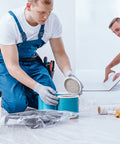 Men using Heavy Duty Mechanics Wipes For The Shop And Garage Large 10x12 Inch Towels For Multi Purpose Surface And Hand Cleaning 6 Canisters Of 72 Count Each Perfect For Removing Paint Oil Grease Dirt And Grime in a workshop.