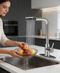 Big Time Upgrade Pull Down Kitchen Sink Faucet Featuring Four High Pressure Spray Modes In Durable Brushed Nickel and Reliable Waterfall Flow for Zero Stress Cleanup Jobs in action rinsing apples.