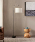 Nora Arc LED Tall Floor Lamp With Heavy Base For Living Room And Office next to round wooden table and sofa