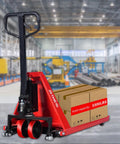 Heavy Duty Manual Scissor Pallet Jack Truck With A Breezy 3300 Pound Lift Capacity And Straight Forward Hydraulic Pump in a warehouse setting with stacked boxes.
