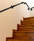 Legit Heavy Duty Galvanized Steel Pipe Stair Handrail, Wall Mounted Farmhouse Railing For Authentic Rustic Home Decor, Damn Sturdy Industrial Steps Safety Rail In Matte Black Finish along wooden stairs.