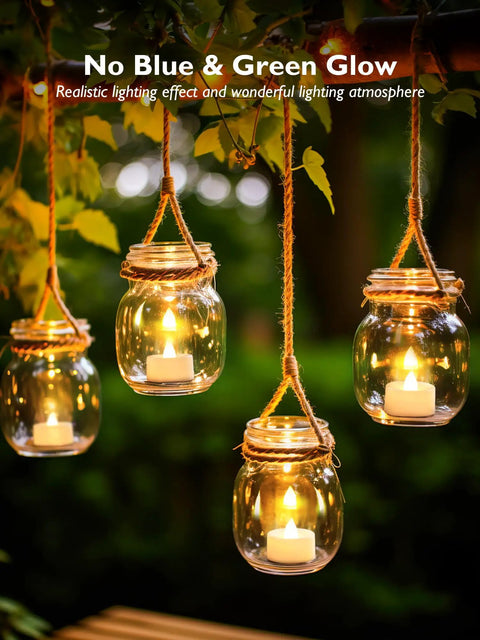 24 Pack Flameless LED Tea Lights Battery Operated Warm White Flickering Mini Candles hanging in jars outdoors