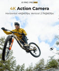 Cyclist in yellow jacket jumps over rock with 4K Foldable Action Camera Drone With SmoothCapture 2.0 capturing footage in air.