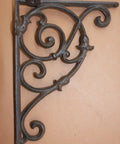 Heavy Duty Victorian Corner Shelf Bracket in Solid Cast Iron with Rustic Brown Finish, detailing vintage curves, set of four.
