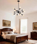 Sputnik 12-Light Black Chandelier for Living Room and Dining Area above a bed in a spacious, elegant bedroom.