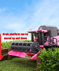 One To Thirty Two Scale Friction Powered Pink Combine Harvester Farm Toy with Rotating Reel and Ladder on Grass Field