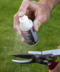 Using Plant Resin Remover Spray For Cutting Tools With Foaming Action on gardening shears outdoors