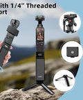 High Capacity Battery Handle For Osmo Pocket 3 And 4 On The Go 5000mAh Power Grip With Mini Tripod on rocky terrain