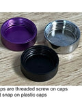 Three threaded caps in purple, black, and silver for Badass Stainless Steel License Plate Screws With Twist On Red Caps.