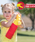 Child playing with Automatic Bubble Blower Fire Extinguisher Style Bubble Machine With 230 Ml Bubble Solution For Kids