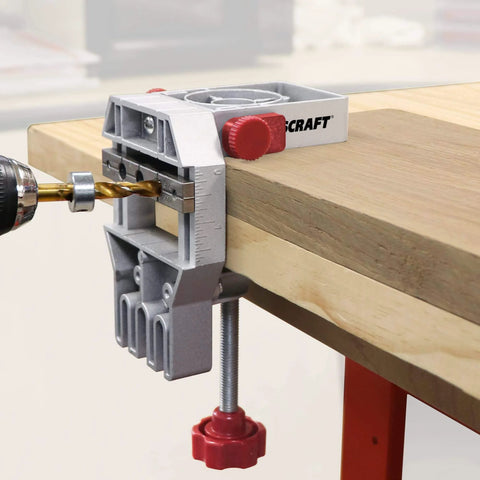 Joint Master Doweling Jig With Self-Clamping Aluminum Frame on wooden tabletop showing edge jointing with drill