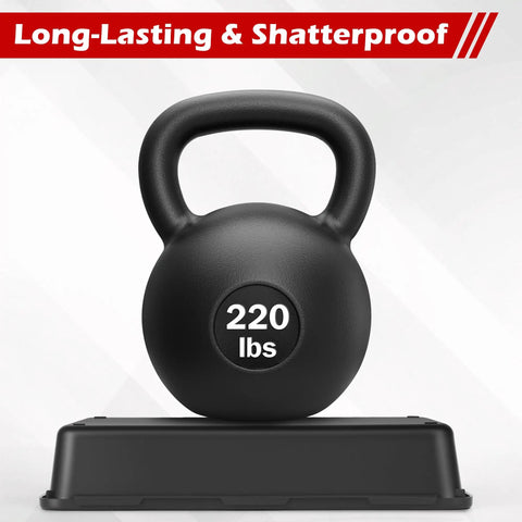 220 lbs black kettlebell on platform, labeled long-lasting and shatterproof
