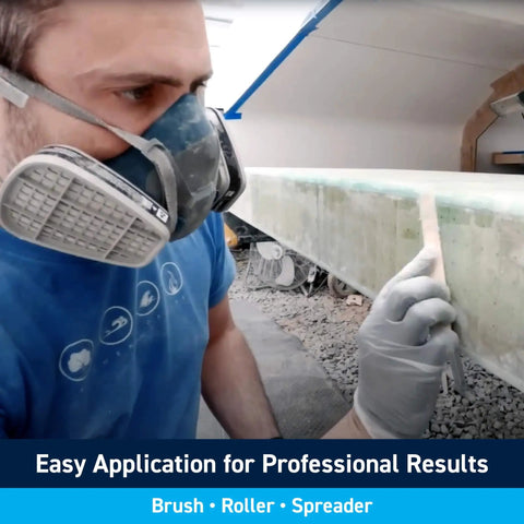 Person applying Fiberglass Reinforced Polyester Structural Repair Putty Quart Kit For Boats And Cars on boat surface