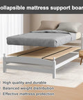 Solid Wood Bunkie Board 30X60 Inches Twin Bed Foundation supports mattress, shown under a gray bed with pillows.