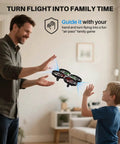 Father and son playing with Kid Friendly Indoor Drone With Obstacle Avoidance And 20 Minute Flight Time With Two Batteries Included One Key 360 Degree Flips And Altitude Hold Ideal Gift For Boys And Girls Aged 8 To 12.