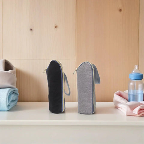 Legit Gotta Have 2 Piece Insulated Baby Bottle Carrier Tote With Stroller Hook in black and gray on a shelf.