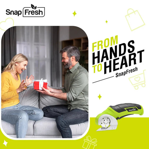 Man gifting woman a SnapFresh cordless electric scissors 4V mini box cutter with replacement blade, green, for DIY projects.