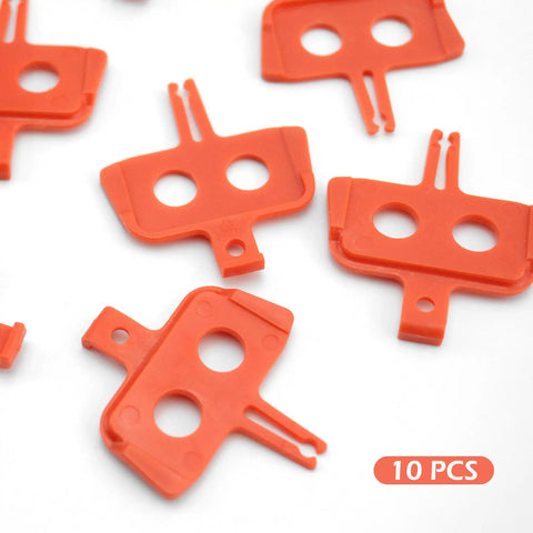 Orange plastic 10 Pack Bike Disc Brake Pad Spacers And Pad Spreader Tool For Hydraulic Disc Brakes on white background