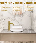 Tall Polished Chrome Vessel Sink Faucet With Deck Mount One Hole Lavatory Tap in a marble bathroom setting