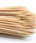 Close-up of Six Inch Bamboo Skewers Pack Of 200 For BBQ Grilling Kabobs Fruit Appetizers And Party Desserts 3mm Thick Natural Wood Sticks
